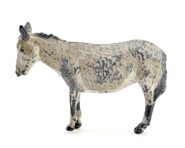 Dierengroep van tinnen figuren ezel, objectnr 81880-E, Museum Rotterdam. William Britains Ltd via Wikimedia Commons, CC BY-SA 3.0