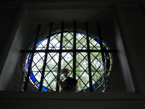 Tralies voor een raam houden ongewenste indringers tegen. Foto: © Anne-Cathérine Olbrechts