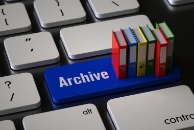 Toetsenbord met daarop het woord 'Archive'. Foto: abluecup via Istock