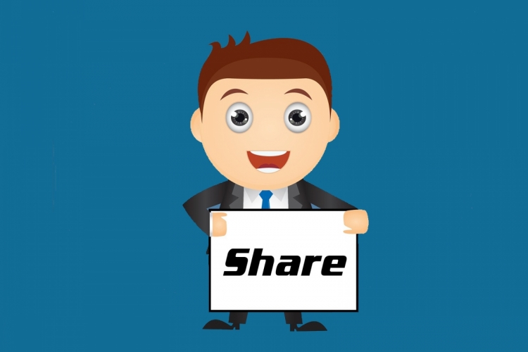Mannetje met bordje 'Share'. Foto: CC0
